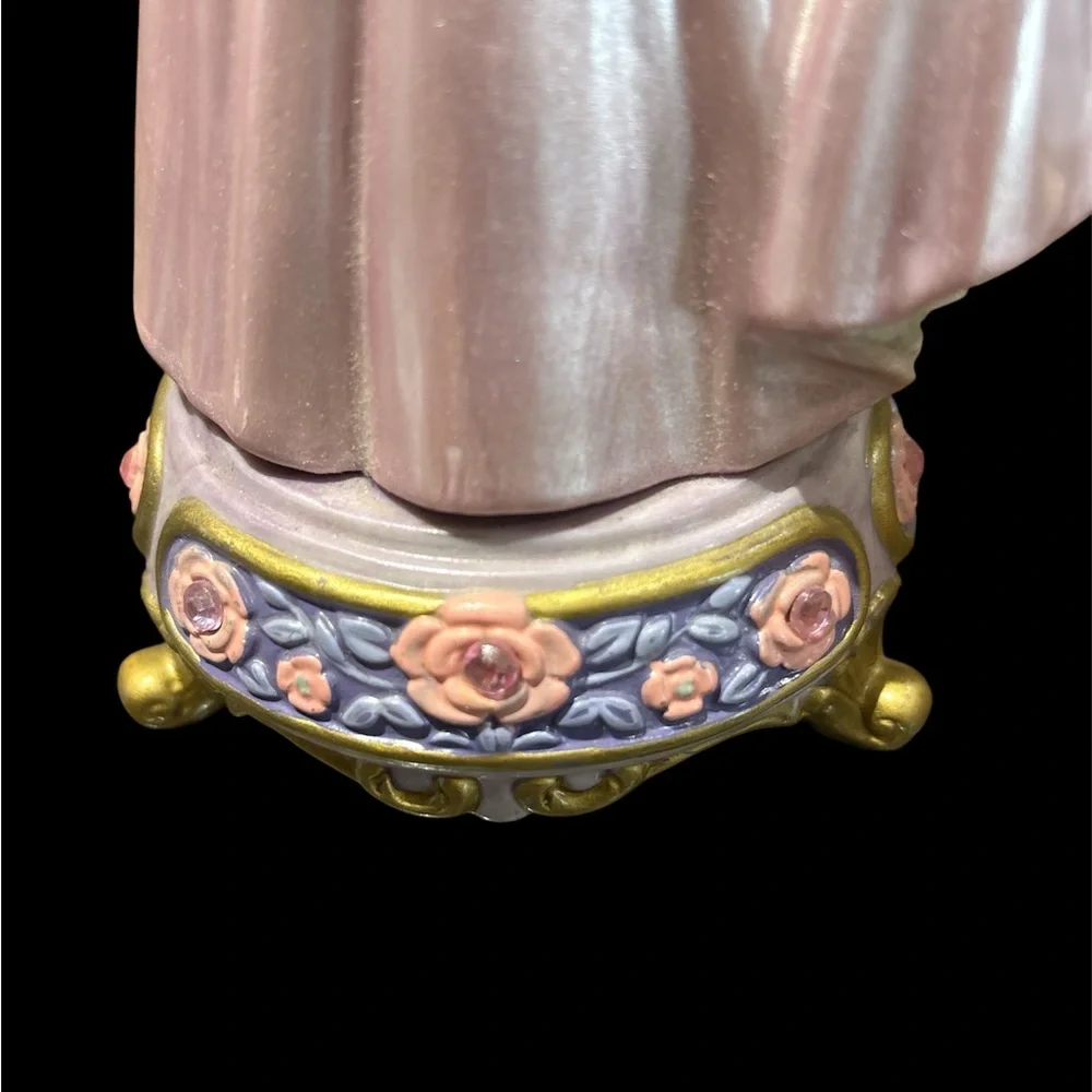 Disney Princess Aurora Figurine with Pink Dress and sparkly crown.